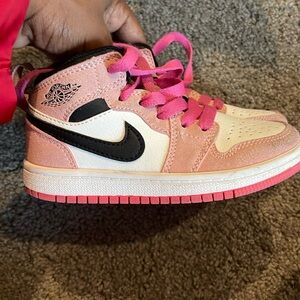 Pink, Black, and White Jordan Girl sneakers dunks.